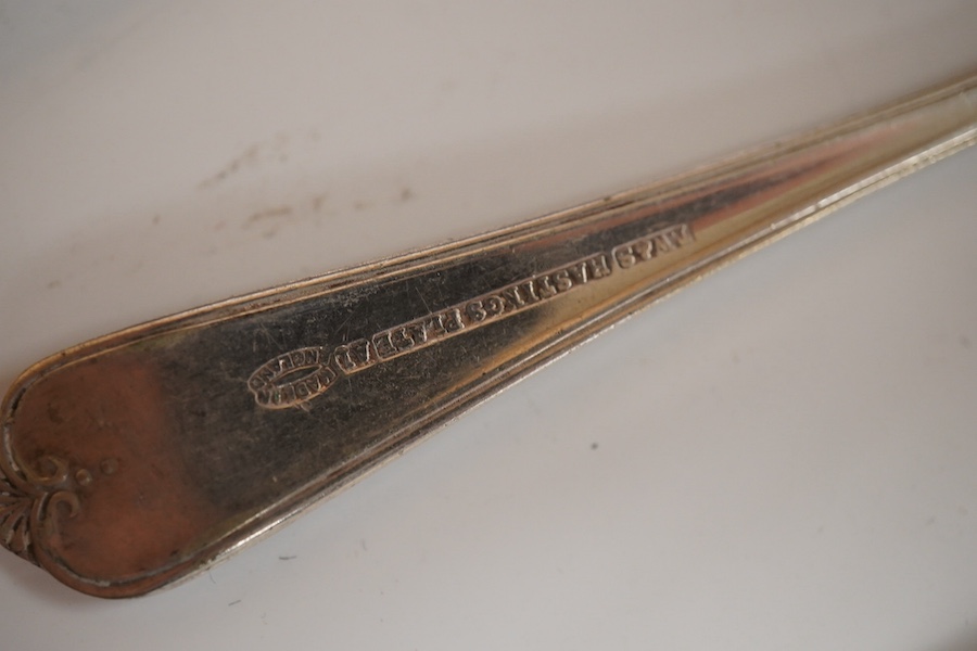 A part canteen of American sterling cutlery comprising thirty eight items, together with nine white metal handled dessert knives, nine table knives and six tea knives, all with engraved initial and a set of six silver pl